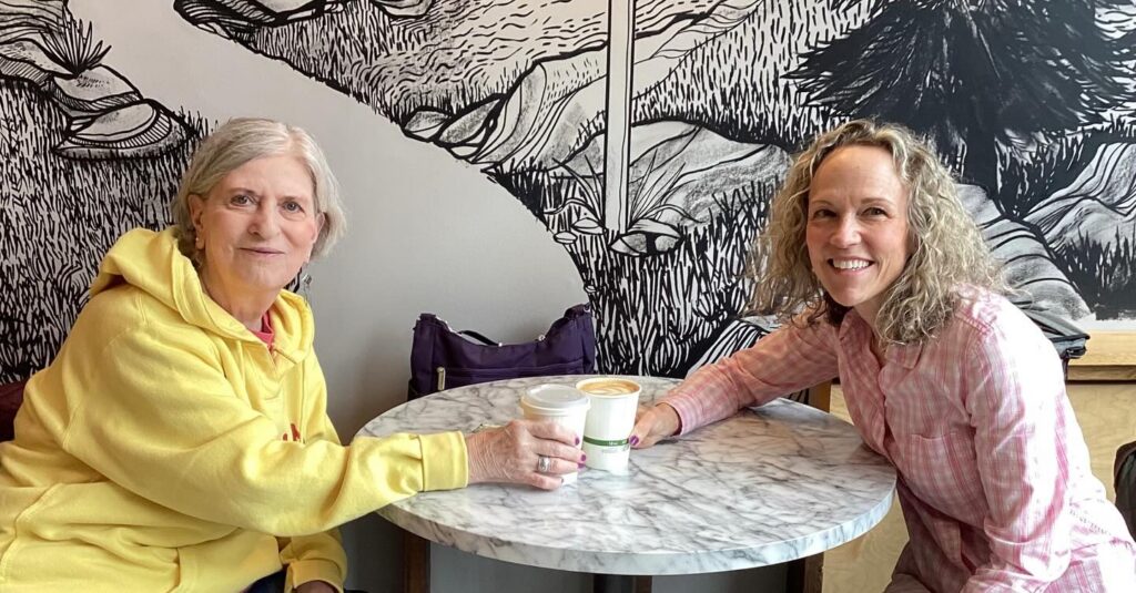Barbara and Helen enjoy coffee during a therapy session.
